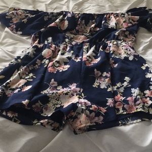 Bright floral off the shoulders romper.